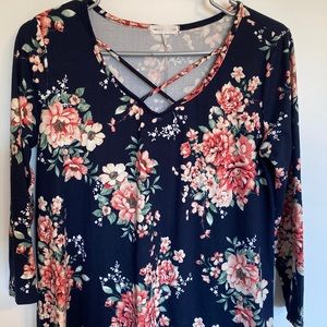 Navy blue tunic floral blouse.